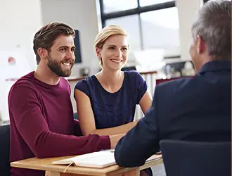 A couple of people sitting at a table